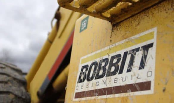 A photo of Bobbitt's logo on the side of a yellow building.
